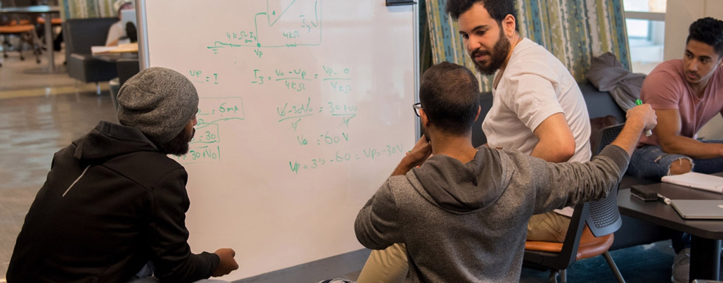 students in JPLL with whiteboard